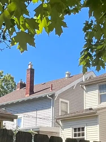 Sunny skies and peaceful neighborhood views.